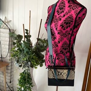 Elegant Black and Tan Crossbody Bag